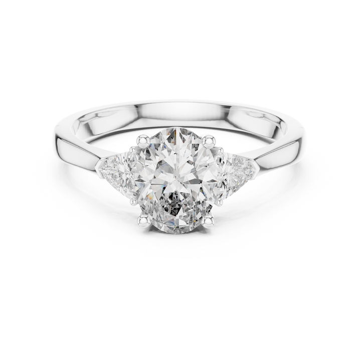 White Gold Oval Cut Diamond Engagement Ring with Tapered Trilliant Stones