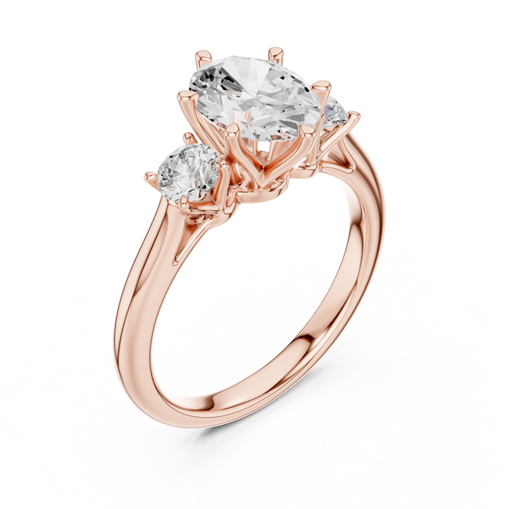 Modern Classic Oval Cut Diamond Ring with Two Round Side Stones | Refined Rose Gold Engagement Ring