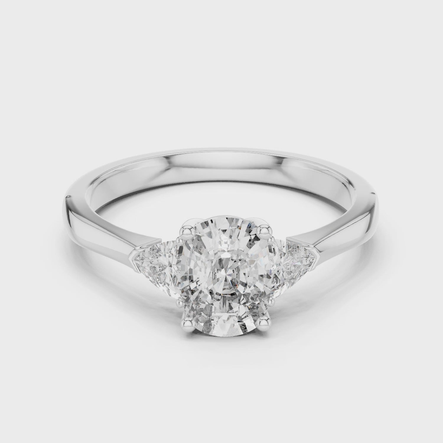 Simple Cushion Cut Diamond Ring with Trapezoid Side Stones