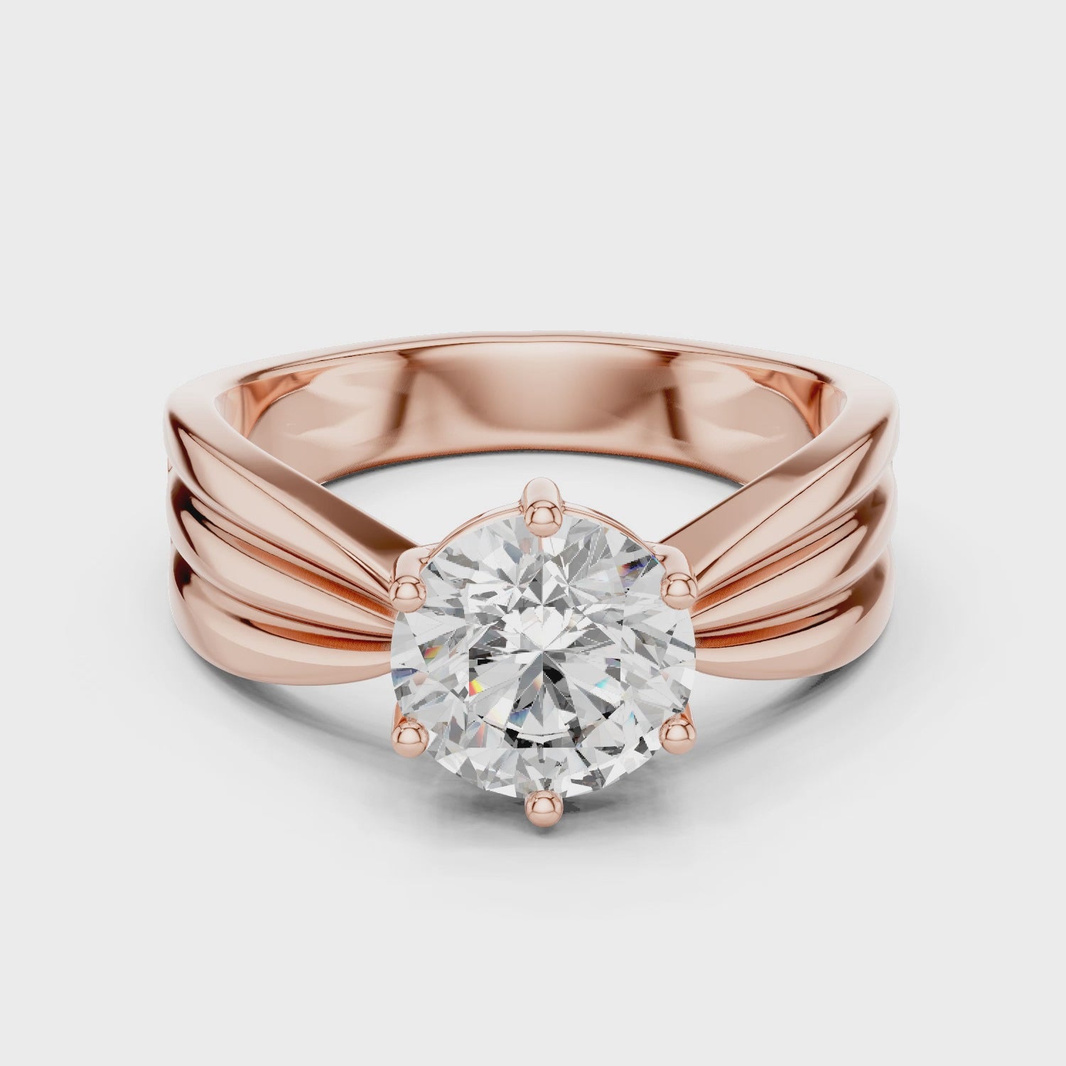 Modern White Gold Solitaire Ring with Sculpted Band